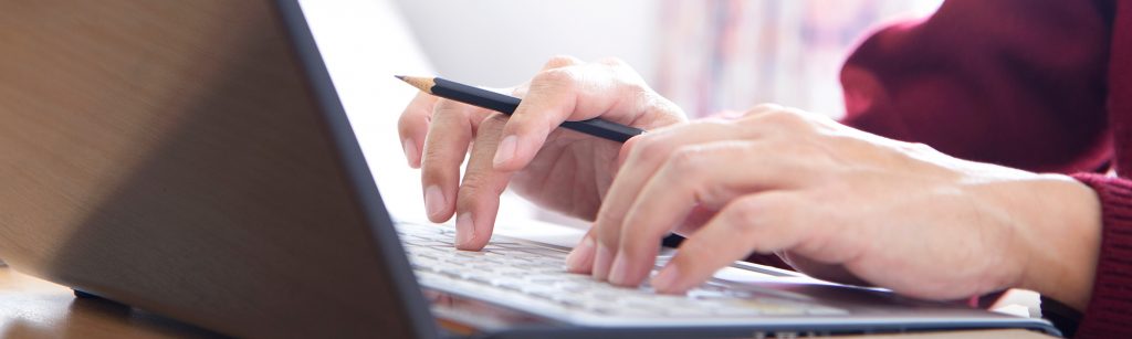 Individual working at a computer